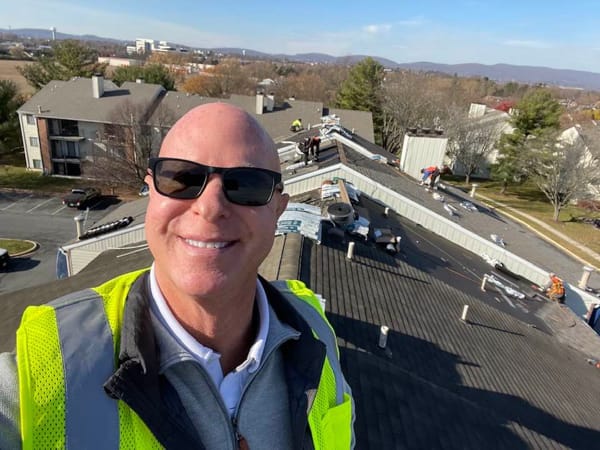 owner rob politz and his crew doing roof repairs
